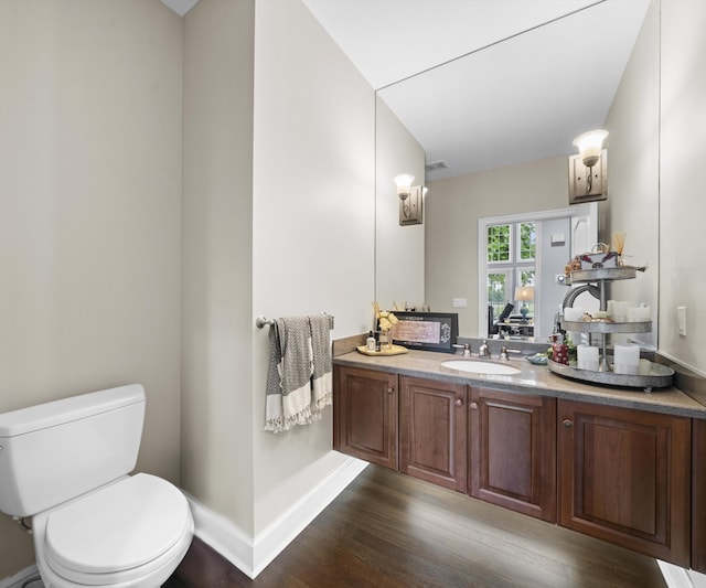 5011 Rockaway Ln, Clarkston, MI 48348 - bathroom featuring wood finished floors and vanity