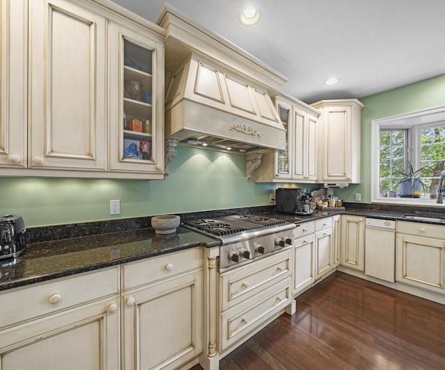 5011 Rockaway Ln, Clarkston, MI 48348 - kitchen featuring cream cabinets, stainless steel gas stovetop, dishwasher, glass insert cabinets, and dark stone countertops