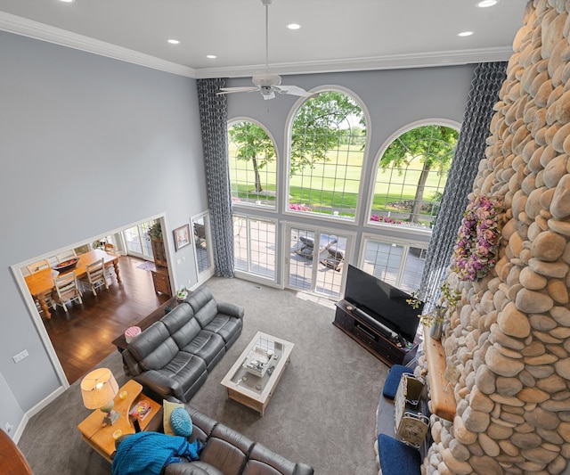 5011 Rockaway Ln, Clarkston, MI 48348 - living area featuring a towering ceiling, ceiling fan, recessed lighting, and ornamental molding