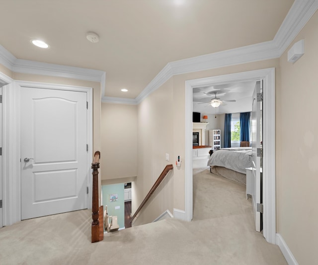5011 Rockaway Ln, Clarkston, MI 48348 - hallway with an upstairs landing, carpet, crown molding, and recessed lighting