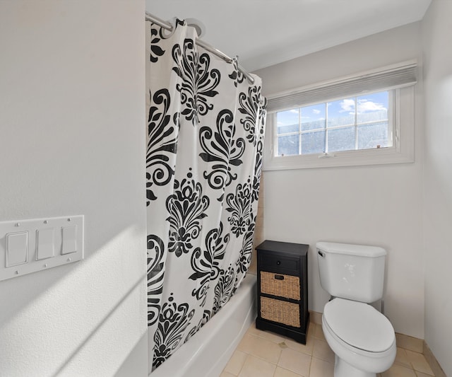 5011 Rockaway Ln, Clarkston, MI 48348 - bathroom with shower / bath combo with shower curtain and tile patterned floors