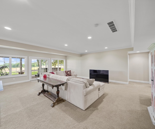 5011 Rockaway Ln, Clarkston, MI 48348 - living area with ornamental molding, light colored carpet, recessed lighting, and plenty of natural light