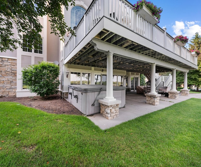5011 Rockaway Ln, Clarkston, MI 48348 - view of patio featuring a hot tub and stairway