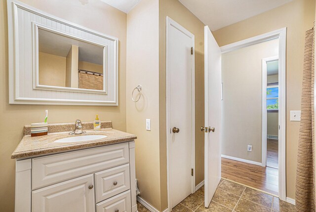 4515 S Lincoln Rd, Mount Pleasant, MI 48858 - full bath featuring vanity and tile patterned floors