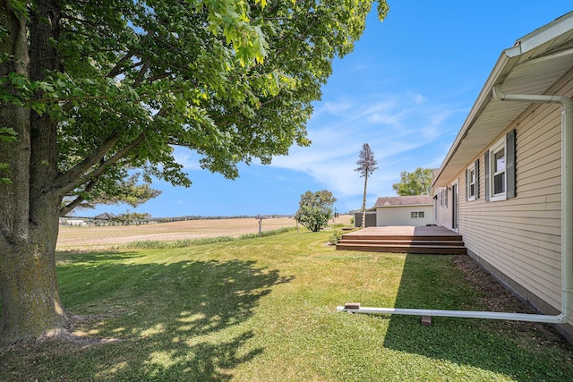 4515 S Lincoln Rd, Mount Pleasant, MI 48858 - view of green lawn with a wooden deck