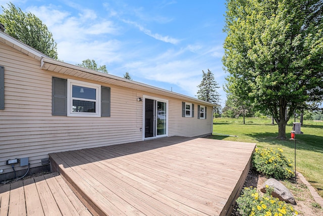 4515 S Lincoln Rd, Mount Pleasant, MI 48858 - wooden deck featuring a lawn
