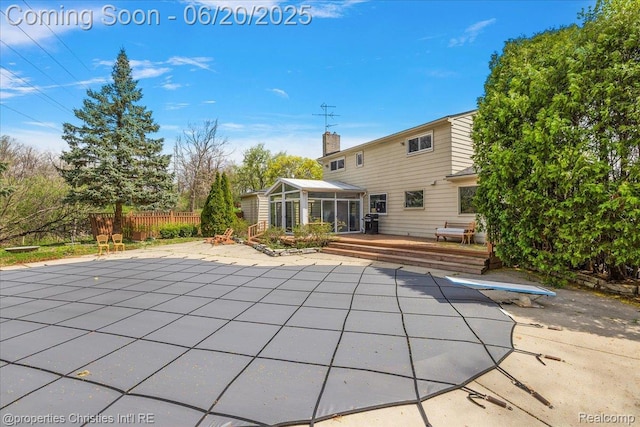 4160 Dawn Ln, West Bloomfield, MI 48323 - view of pool featuring a deck, a sunroom, and a patio