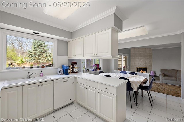 4160 Dawn Ln, West Bloomfield, MI 48323 - kitchen with dishwasher, ornamental molding, light countertops, white cabinets, and a fireplace