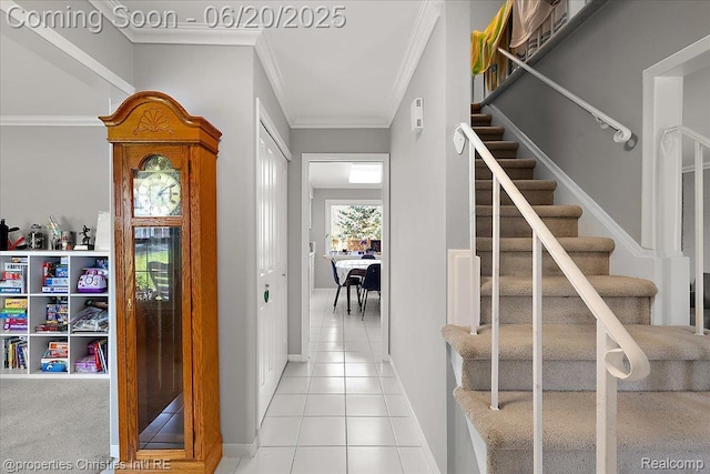 4160 Dawn Ln, West Bloomfield, MI 48323 - entryway featuring crown molding, light tile patterned floors, and stairway