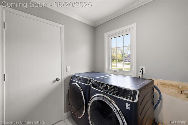 4160 Dawn Ln, West Bloomfield, MI 48323 - laundry area featuring crown molding and washing machine and clothes dryer