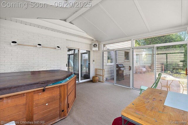 4160 Dawn Ln, West Bloomfield, MI 48323 - sunroom with a hot tub and healthy amount of natural light