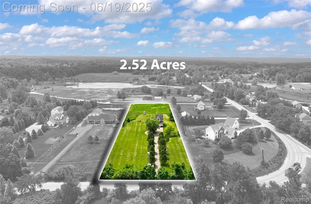 2102 Oakwood Rd, Ortonville, MI 48462 - aerial view of property and surrounding area with property boundaries highlighted