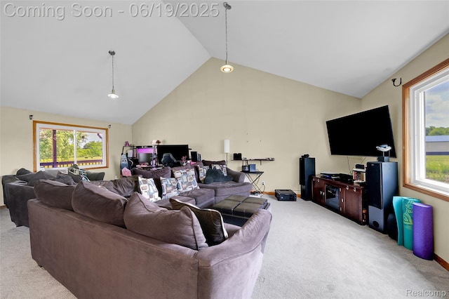 2102 Oakwood Rd, Ortonville, MI 48462 - living area featuring light colored carpet and high vaulted ceiling