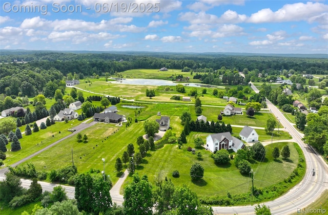 2102 Oakwood Rd, Ortonville, MI 48462 - drone / aerial view of a large body of water and a forest