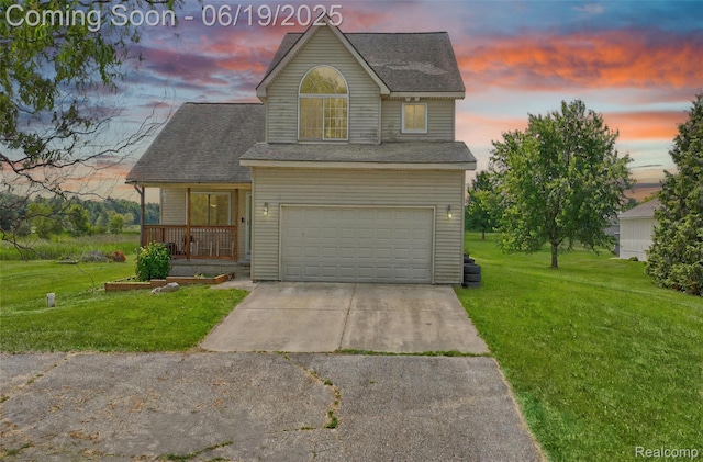 2102 Oakwood Rd, Ortonville, MI 48462 - traditional-style home featuring a lawn, concrete driveway, an attached garage, and a shingled roof