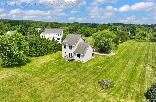 2102 Oakwood Rd, Ortonville, MI 48462 - view from above of property featuring a heavily wooded area