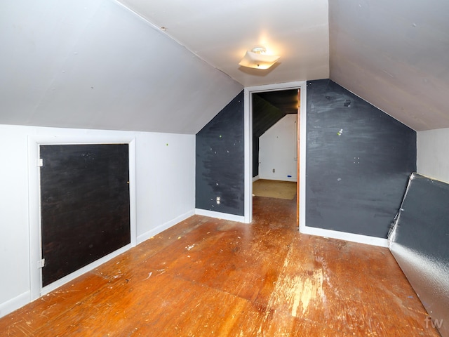 223 Ruth St, Portage, MI 49002 - additional living space with vaulted ceiling and wood finished floors