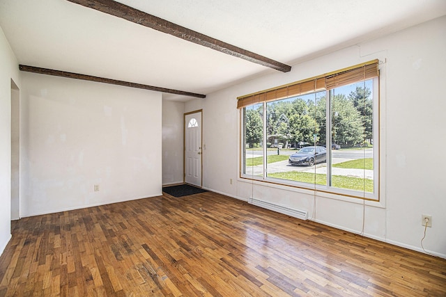 8814 S Sprinkle Rd, Portage, MI 49002 - entryway with a baseboard heating unit, beamed ceiling, and hardwood / wood-style flooring