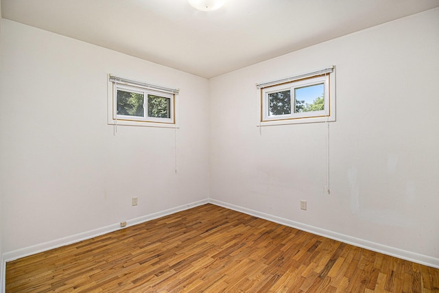 8814 S Sprinkle Rd, Portage, MI 49002 - unfurnished room featuring light wood finished floors and healthy amount of natural light