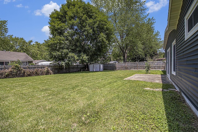 8814 S Sprinkle Rd, Portage, MI 49002 - fenced backyard with a storage unit and a patio