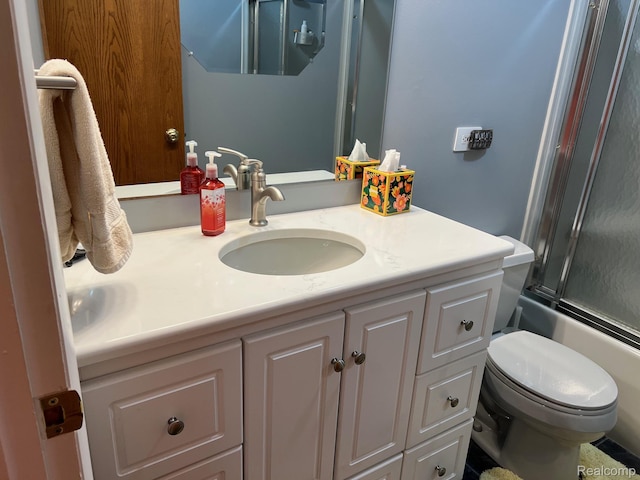 7369 Sheridan Rd, Flushing, MI 48433 - bathroom featuring vanity and combined bath / shower with glass door