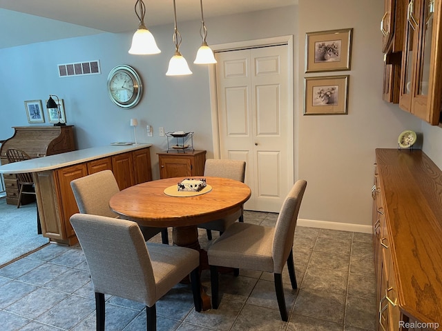 7369 Sheridan Rd, Flushing, MI 48433 - dining room featuring tile patterned flooring and baseboards
