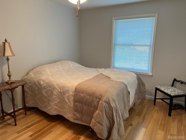 7369 Sheridan Rd, Flushing, MI 48433 - bedroom with light wood finished floors