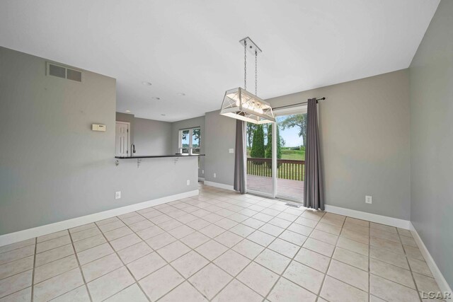 7555 Sherlock Dr, Onsted, MI 49265 - spare room with light tile patterned flooring