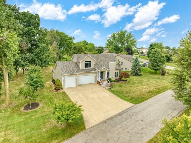 7555 Sherlock Dr, Onsted, MI 49265 - traditional home with an attached garage, driveway, a front yard, a shingled roof, and a chimney