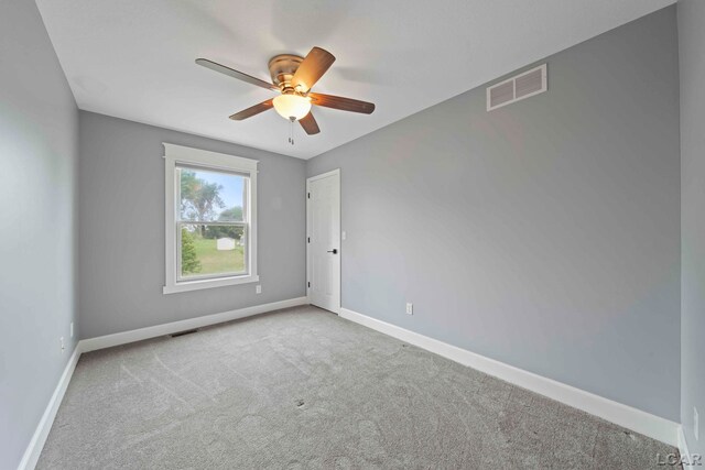 7555 Sherlock Dr, Onsted, MI 49265 - carpeted spare room with a ceiling fan and baseboards