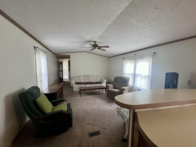 2701 Huizenga St Trlr # 4, Norton Shores, MI 49444 - carpeted living area featuring a ceiling fan, a textured ceiling, crown molding, and lofted ceiling