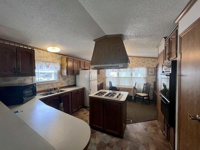 2701 Huizenga St Trlr # 4, Norton Shores, MI 49444 - kitchen with wallpapered walls, black appliances, premium range hood, a textured ceiling, and a center island