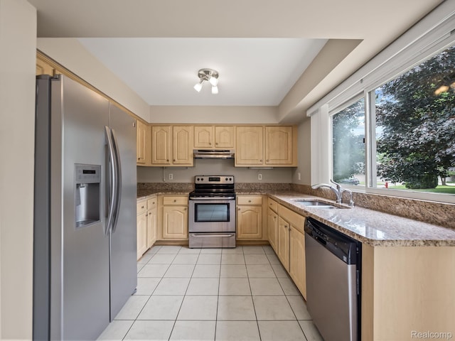 1829 Golf Ridge Dr, Bloomfield Hills, MI 48302 - kitchen with appliances with stainless steel finishes, light brown cabinets, under cabinet range hood, light tile patterned floors, and light stone countertops