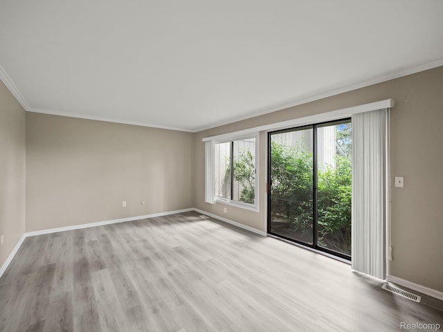 1829 Golf Ridge Dr, Bloomfield Hills, MI 48302 - spare room with plenty of natural light, ornamental molding, and wood finished floors