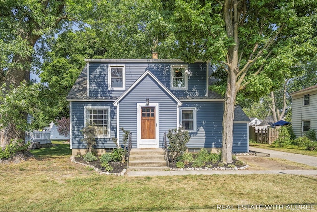 537 Graafschap Rd, Holland, MI 49423 - view of front of property with a chimney and roof with shingles