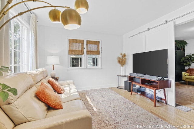 537 Graafschap Rd, Holland, MI 49423 - living room featuring light wood-style floors and baseboards