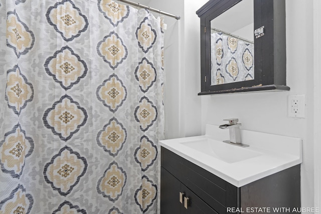 537 Graafschap Rd, Holland, MI 49423 - full bathroom with vanity and a shower with shower curtain
