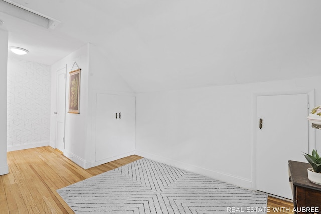 537 Graafschap Rd, Holland, MI 49423 - hallway featuring light wood finished floors and vaulted ceiling