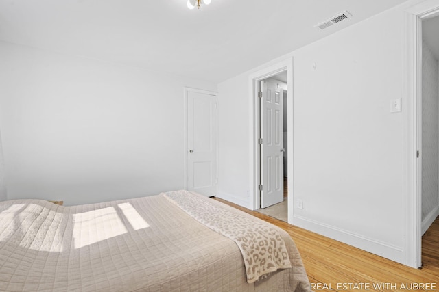 537 Graafschap Rd, Holland, MI 49423 - bedroom with light wood finished floors and baseboards