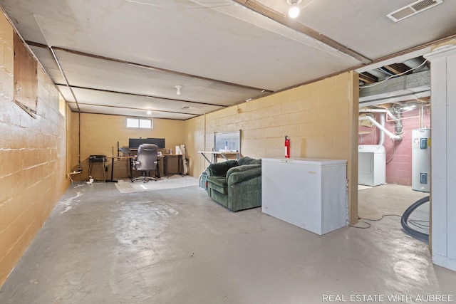 537 Graafschap Rd, Holland, MI 49423 - below grade area with refrigerator, an office area, water heater, concrete block wall, and washer and dryer