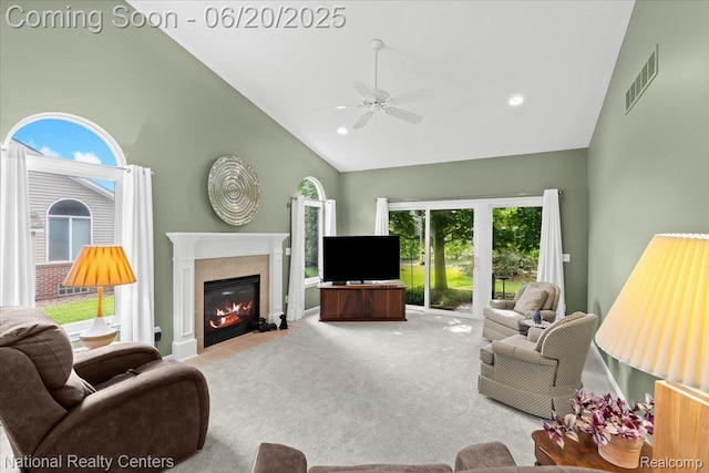 332 Asbury Ct, Highland, MI 48357 - living area featuring high vaulted ceiling, ceiling fan, a tiled fireplace, healthy amount of natural light, and recessed lighting