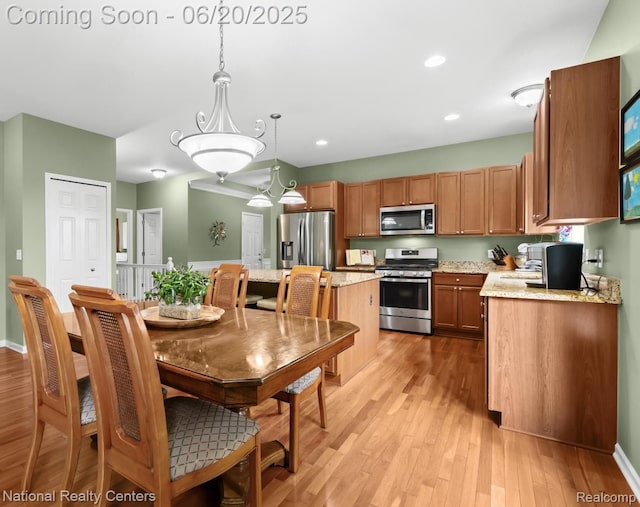 332 Asbury Ct, Highland, MI 48357 - dining space with light wood finished floors and recessed lighting