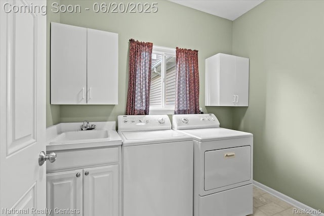 332 Asbury Ct, Highland, MI 48357 - laundry area featuring cabinet space and separate washer and dryer