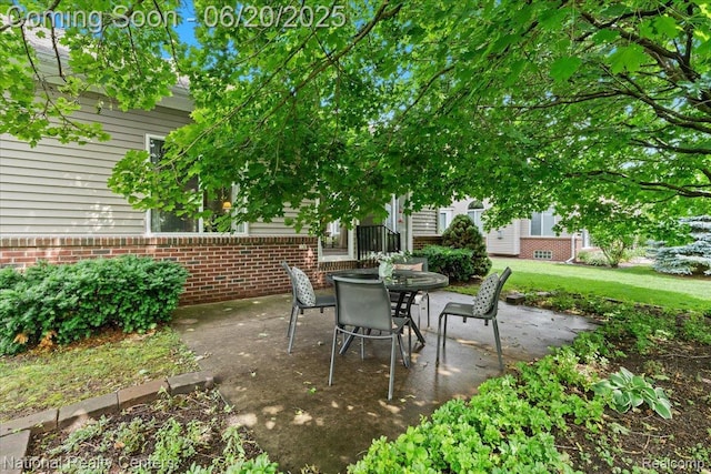 332 Asbury Ct, Highland, MI 48357 - view of patio with outdoor dining space