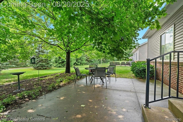 332 Asbury Ct, Highland, MI 48357 - view of patio with outdoor dining space