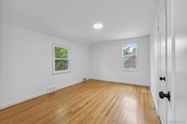 3900 Somerset Ave, Grosse Pointe Woods, MI 48224 - unfurnished room with plenty of natural light and light wood finished floors