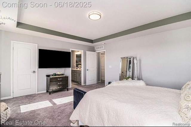 8757 Grove St, Washington, MI 48094 - carpeted bedroom featuring a tray ceiling and connected bathroom