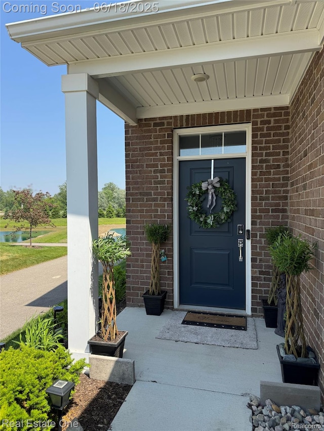 8757 Grove St, Washington, MI 48094 - view of exterior entry with brick siding