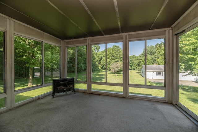 10229 N 22nd St, Plainwell, MI 49080 - unfurnished sunroom featuring healthy amount of natural light and view of wooded area