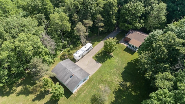 10229 N 22nd St, Plainwell, MI 49080 - aerial view of property and surrounding area featuring a heavily wooded area